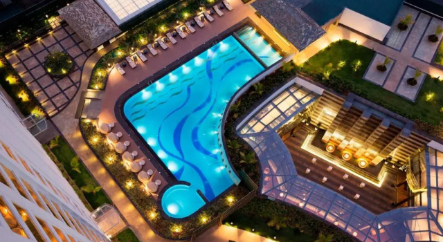 Четырёхместный номер Standard с видом на бассейн Bengaluru Marriott Hotel Whitefield