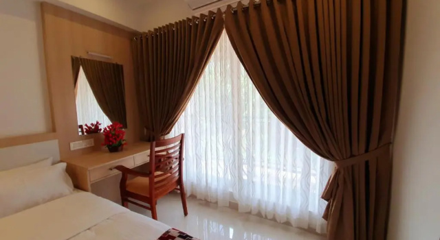 Athirappilly Rainland Resort, Забронировать Курортный отель Атираппилли штат Керала