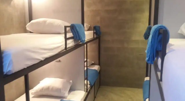 Кровать в общем номере Cycling Backpacker Hostel