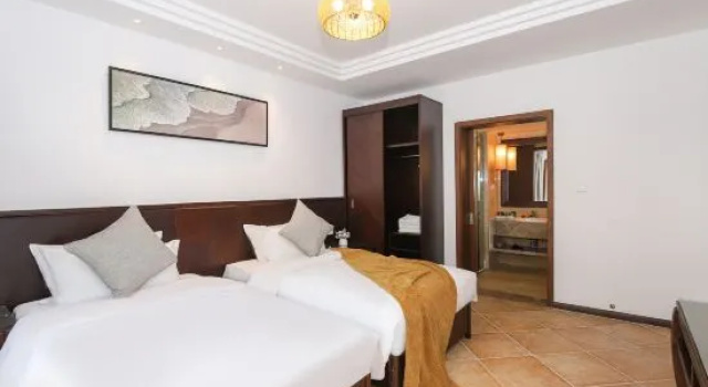 Семейный люкс с 2 комнатами Nantianhu Jingshan Homestay