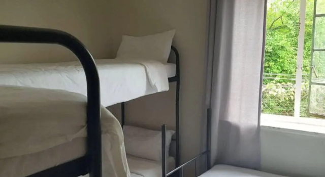 Кровать в общем номере Stumble Inn Backpackers Lodge