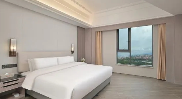 Люкс Deluxe Meizhou International Hotel