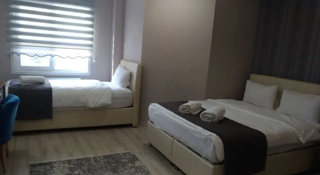 Четырёхместный семейный номер Standard Grand Dost Hotel