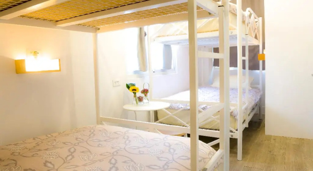 Кровать в общем номере Hualien Bird's House Hostel