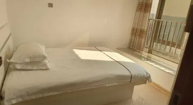 Семейный люкс с балконом Shuyuan hotel apartment (Lihai Asia international store, Nanning)