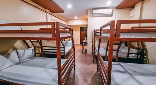 Кровать в общем номере Buddha Resort by Cocotel