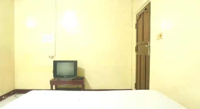 Номер Standard Hotel O Rumah Massagena Syariah Near Gedung Olahraga Enrekang
