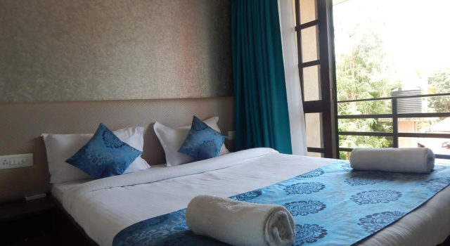 Woodside Retreat Serviced Apartments, 100 meters from baga river, Varaa Huoneisto Baga 