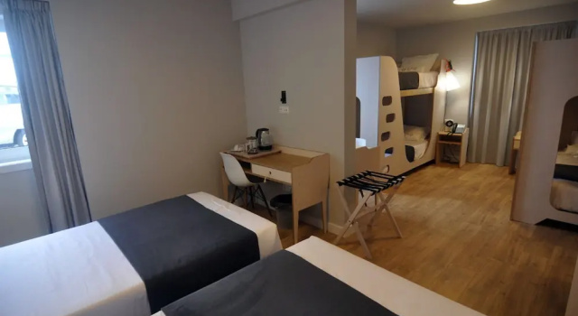 Кровать в общем номере Porto Velho Boutique Lodge