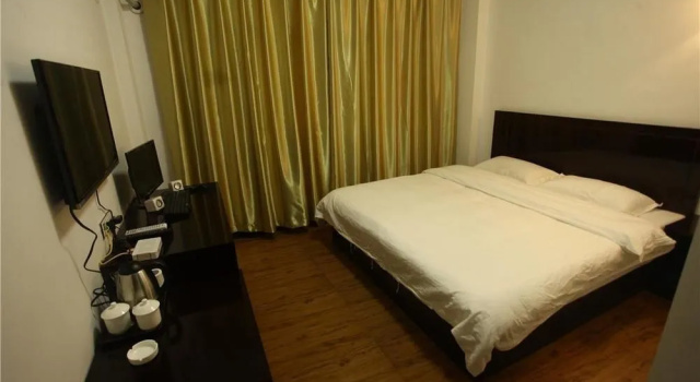 Nan'an Business Hotel, Забронировать Отель Отели Энши с парковкой, рядом с Enshi Railway Station, Парковка