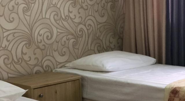 Кровать в общем номере Мини-Отель Патио