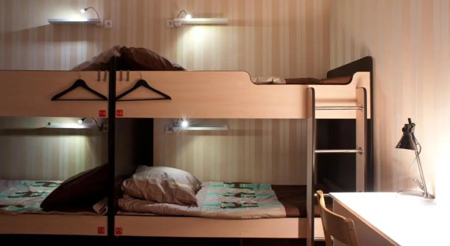 Postel ve společném pokoji pro ženy a výhledem Lodging houses Infinity