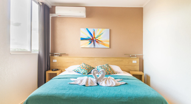 Номер Deluxe Q-Inn Boutique Hotel
