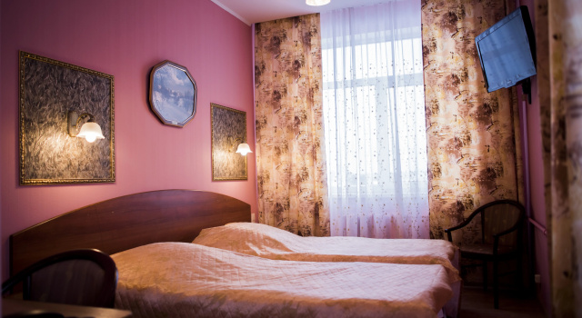 Двухместный номер Первой категории улучшенный стандарт c 1 комнатой Гостиница Октябрьская